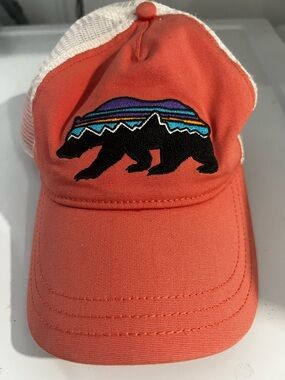 Patagonia Coral and White Trucker Hat with Multicolor Bear Patch